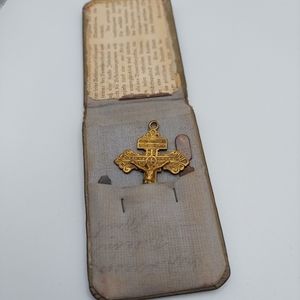 Vintage Brass Crucifixion Cross w/ Holder. German writings in holder.